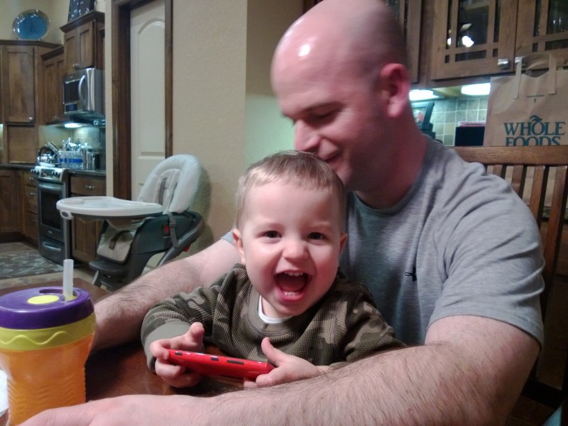 A grand smile resulting from Daddy kisses!